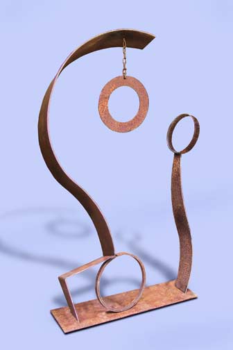 Metal Sculpture - Two rusted metal spires look like a ruin